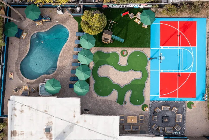 Aerial view of an outdoor recreation area with a swimming pool